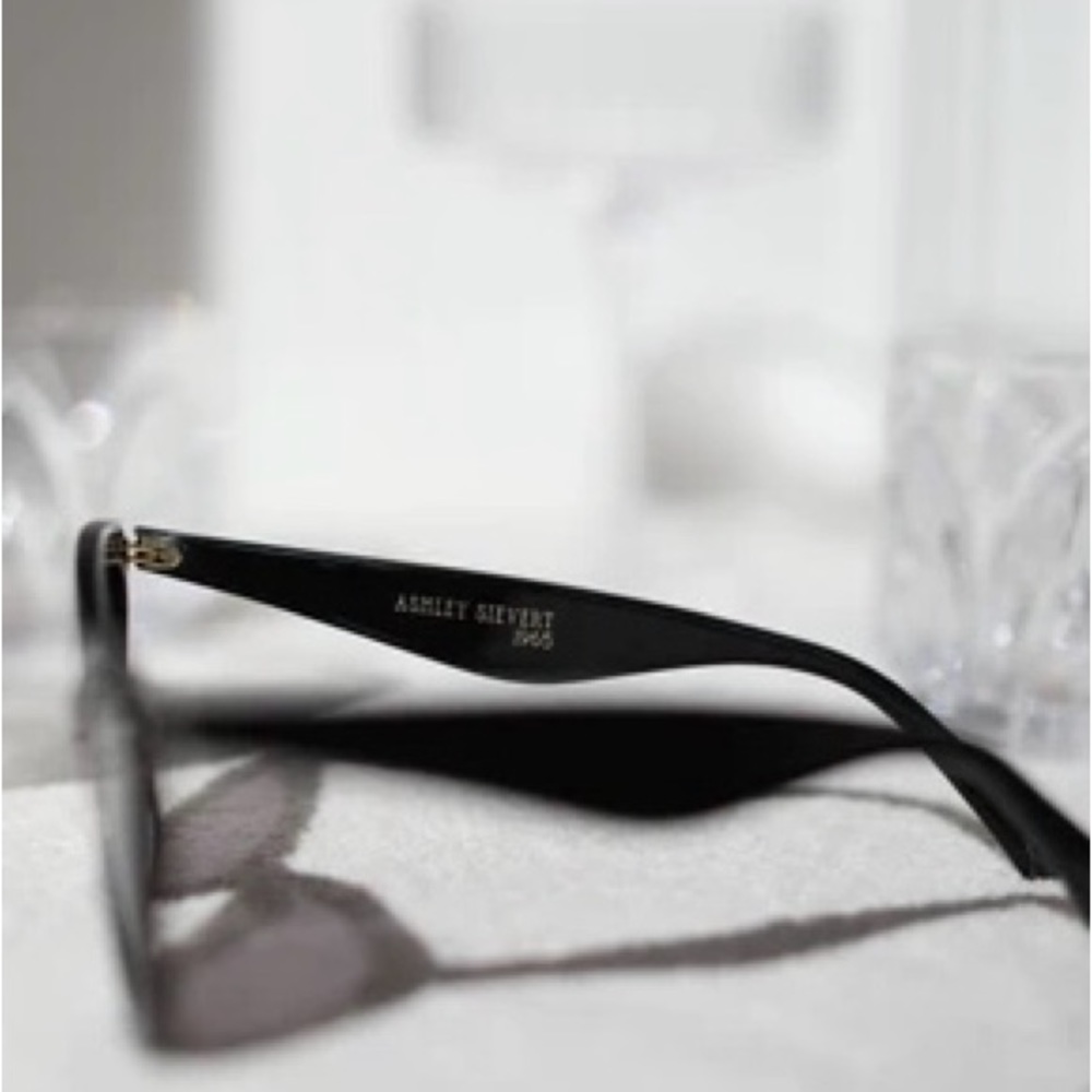 Brand new, never worn in the case. Black cat eye sunglasses. - Picture 2 of 5